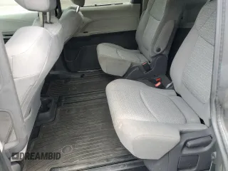 2021 Toyota Sienna LE with VIN 5TDBSKFC4MS027897, listed as a Copart auction lot 56052375 with 66,604 mi miles and Salvage title. Bid and sale history available at DreamBid. Image 11.