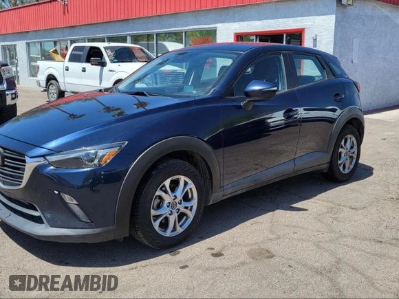 2020 Mazda CX-3 Sport with VIN JM1DKDB76L1465863, listed as a IAAI auction lot 42137563 with 180,000 mi miles. Bid and sale history available at carsss.com. Image 2.
