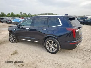 2022 Cadillac XT6 Premium Luxury with VIN 1GYKPCRS1NZ152828, listed as a Copart auction lot 64646525 with 18,913 mi miles and Salvage title. Bid and sale history available at DreamBid. Image 2.