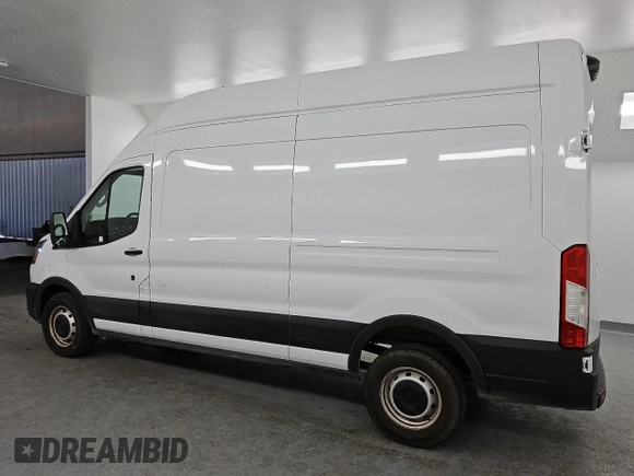 2023 Ford Transit Cargo z VIN 1FTBR1X8XPKB01724, wystawiony jako Copart lot #43828525 z przebiegiem 39 657 mil mil oraz Czysty tytuł • Clean title. Historia ofert i sprzedaży dostępna na DreamBid. Obrazek 2.