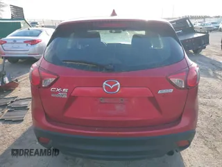 2014 Mazda CX-5 Sport with VIN JM3KE4BE6E0370104, listed as a IAAI auction lot 41879275 with 183,882 mi miles. Bid and sale history available at carsss.com. Image 16.