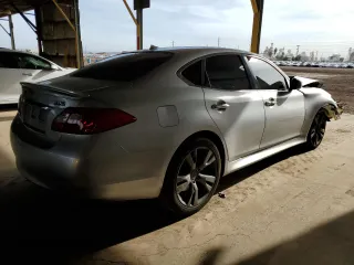 2011 Infiniti M with VIN JN1BY1APXBM324638, listed as a Copart auction lot 51014985 with 194,447 mi miles and Salvage title. Bid and sale history available at DreamBid. Image 3.