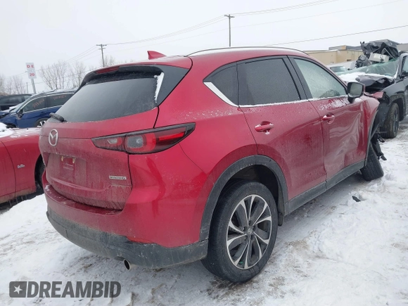 2022 Mazda CX-5 2.5 S Premium Package with VIN JM3KFBDM0N1628116, listed as a IAAI auction lot 41455990 with 29,911 mi miles. Bid and sale history available at carsss.com. Image 4.