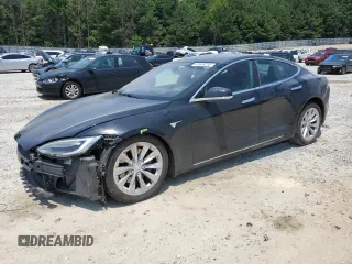 2017 Tesla Model S 100D with VIN 5YJSA1E21HF209847, listed as a Copart auction lot 61848255 with 140,807 mi miles and Salvage title. Bid and sale history available at DreamBid. Image 1.