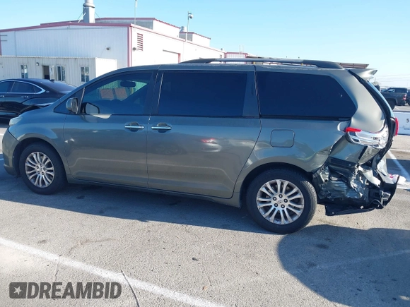 2011 Toyota Sienna XLE AAS with VIN 5TDYK3DC6BS072856, listed as a IAAI auction lot 42684298 with 113,202 mi miles and . Bid and sale history available at DreamBid. Image 14.