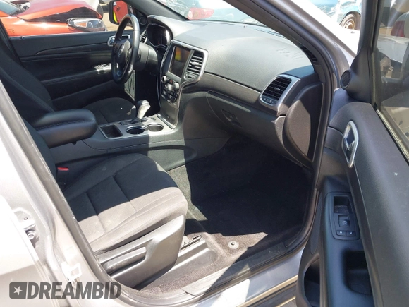 2018 Jeep Grand Cherokee Laredo E with VIN 1C4RJEAG2JC429850, listed as a IAAI auction lot 42541574 with 72,009 mi miles and . Bid and sale history available at DreamBid. Image 5.