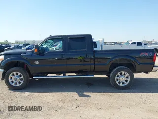 2014 Ford Super Duty F-250 SRW XL with VIN 1FT7W2BT7EEB23580, listed as a IAAI auction lot 42009328 with 102,149 mi miles. Bid and sale history available at carsss.com. Image 15.
