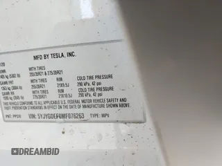 2021 Tesla Model Y Performance z VIN 5YJYGDEF0MF076263, wystawiony jako IAAI lot #42134022 z przebiegiem Nie podano mil oraz . Historia ofert i sprzedaży dostępna na DreamBid. Obrazek 9.