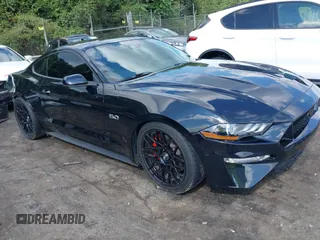 2021 Ford Mustang GT with VIN 1FA6P8CF0M5149169, listed as a IAAI auction lot 40151328 with 22,295 mi miles. Bid and sale history available at carsss.com. Image 1.