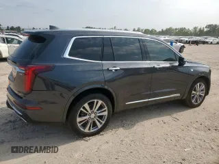 2022 Cadillac XT6 Premium Luxury z VIN 1GYKPCRS1NZ104567, wystawiony jako Copart lot #58211505 z przebiegiem 54 541 mil mil oraz Tytuł czysty. Historia ofert i sprzedaży dostępna na DreamBid. Obrazek 3.