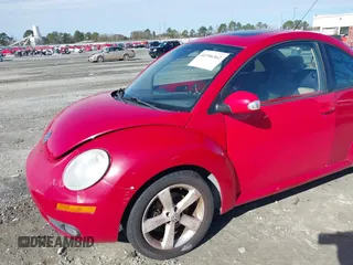 2006 Volkswagen New Beetle Coupe with VIN 3VWSW31C56M403105, listed as a IAAI auction lot 41396362 with 157,213 mi miles. Bid and sale history available at carsss.com. Image 6.