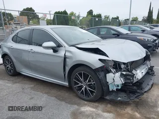 2023 Toyota Camry SE with VIN 4T1G11AKXPU809876, listed as a IAAI auction lot 42100546 with 35,055 mi miles and . Bid and sale history available at DreamBid. Image 1.