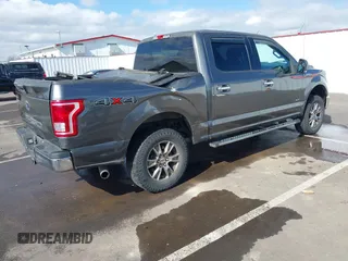 2015 Ford F-150 XLT with VIN 1FTEW1EG1FKE89277, listed as a IAAI auction lot 41752106 with 142,069 mi miles. Bid and sale history available at carsss.com. Image 4.