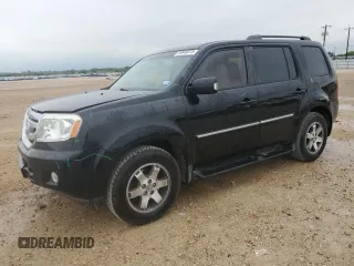 2011 Honda Pilot Touring z VIN 5FNYF3H95BB037717, wystawiony jako Copart lot #55648075 z przebiegiem 269 641 mil mil oraz Szkoda całkowita • Salvage title. Historia ofert i sprzedaży dostępna na DreamBid. Obrazek 1.