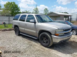 2006 Chevrolet Tahoe Z71 z VIN 1GNEC13TX6J102893, wystawiony jako IAAI lot #41984796 z przebiegiem 273 925 mil mil oraz . Historia ofert i sprzedaży dostępna na DreamBid. Obrazek 1.