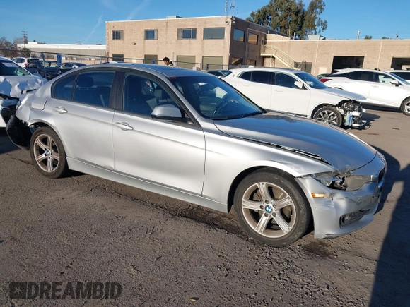 2013 BMW 3 Series 320i with VIN WBA3B1C53DK129703, listed as a IAAI auction lot 41295234 with 175,506 mi miles. Bid and sale history available at carsss.com. Image 1.