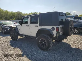 2008 Jeep Wrangler Unlimited X with VIN 1J4GB39128L576571, listed as a Copart auction lot 52706105 with 197,655 mi miles and Clean Title. Bid and sale history available at DreamBid. Image 2.