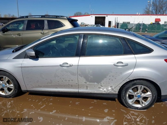 2012 Ford Focus SE with VIN 1FAHP3F2XCL152921, listed as a IAAI auction lot 41962319 with 149,910 mi miles. Bid and sale history available at carsss.com. Image 14.