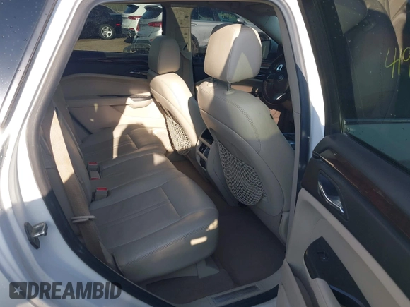 2012 Cadillac SRX Performance Collection with VIN 3GYFNEE35CS561247, listed as a IAAI auction lot 41930292 with 265,599 mi miles and . Bid and sale history available at carsss.com. Image 8.