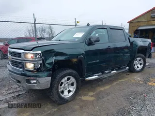 2014 Chevrolet Silverado 1500 LT with VIN 3GCUKREC1EG516826, listed as a IAAI auction lot 41119573 with 164,844 mi miles and . Bid and sale history available at DreamBid. Image 18.