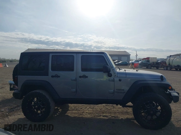 2016 Jeep Wrangler Unlimited Sport z VIN 1C4HJWDGXGL328531, wystawiony jako IAAI lot #42056907 z przebiegiem 75 871 mil mil oraz . Historia ofert i sprzedaży dostępna na DreamBid. Obrazek 13.