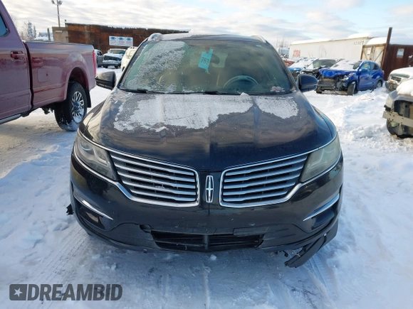 2015 Lincoln MKC with VIN 5LMTJ2AHXFUJ01440, listed as a IAAI auction lot 41526975 with 104,280 mi miles. Bid and sale history available at carsss.com. Image 12.