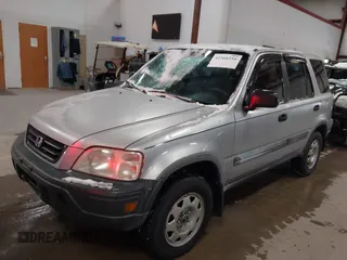 2001 Honda CR-V LX with VIN JHLRD28451S011633, listed as a IAAI auction lot 41566216 with 185,533 mi miles. Bid and sale history available at carsss.com. Image 2.