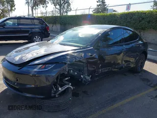 2024 Tesla Model 3 with VIN 5YJ3E1EA0RF718703, listed as a IAAI auction lot 41278243 with 6,504 mi miles. Bid and sale history available at carsss.com. Image 19.