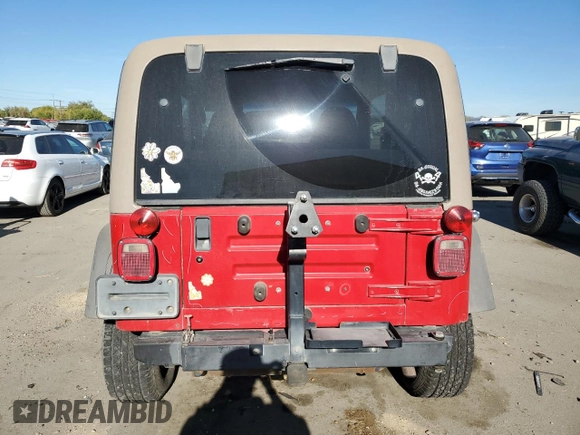 2000 Jeep Wrangler Sport with VIN 1J4FA49S1YP703560, listed as a Copart auction lot 73647844 with 117,300 mi miles and Salvage Title. Bid and sale history available at carsss.com. Image 6.