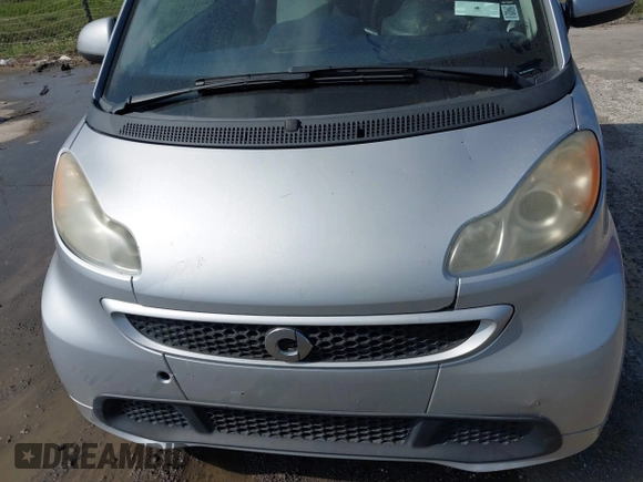 2012 Smart fortwo Pure z VIN WMEEJ3BA1CK560131, wystawiony jako IAAI lot #41540976 z przebiegiem 58 962 mil mil oraz . Historia ofert i sprzedaży dostępna na DreamBid. Obrazek 10.