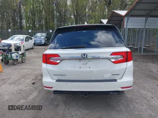 2018 Honda Odyssey Touring with VIN 5FNRL6H81JB023530, listed as a IAAI auction lot 42040124 with 109,128 mi miles and . Bid and sale history available at DreamBid. Image 16.