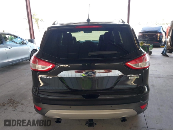2015 Ford Escape Titanium with VIN 1FMCU0J98FUB95597, listed as a IAAI auction lot 41785188 with 84,141 mi miles. Bid and sale history available at carsss.com. Image 15.