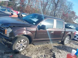 2018 Ford F-150 XL with VIN 1FTEW1C50JFA26307, listed as a IAAI auction lot 41091268 with 129,012 mi miles and . Bid and sale history available at DreamBid. Image 14.