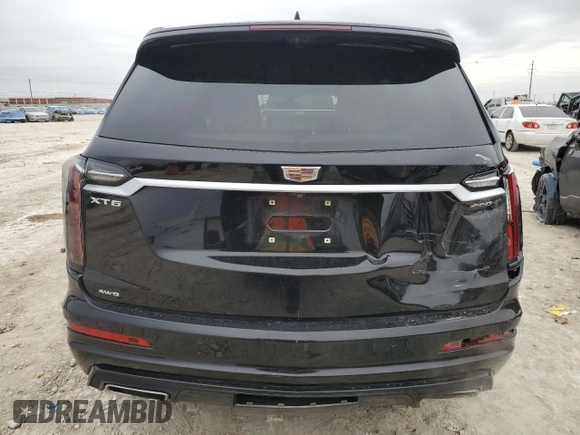 2021 Cadillac XT6 Sport z VIN 1GYKPGRS3MZ140296, wystawiony jako Copart lot #46094285 z przebiegiem 49 429 mil mil oraz Szkoda całkowita • Salvage title. Historia ofert i sprzedaży dostępna na DreamBid. Obrazek 6.