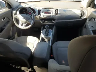 2013 Kia Sportage LX z VIN KNDPBCA29D7459647, wystawiony jako Copart lot #50081725 z przebiegiem 125 855 mil mil oraz Szkoda całkowita • Salvage title. Historia ofert i sprzedaży dostępna na DreamBid. Obrazek 8.
