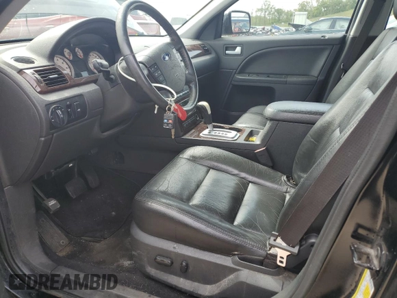 2006 Ford Five Hundred Limited z VIN 1FAFP28146G165585, wystawiony jako Copart lot #57722995 z przebiegiem 201 490 mil mil oraz Nie do naprawy. Historia ofert i sprzedaży dostępna na DreamBid. Obrazek 7.