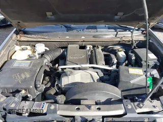 2007 GMC Envoy SLE with VIN 1GKDS13S372241844, listed as a IAAI auction lot 41575443 with 144,726 mi miles. Bid and sale history available at carsss.com. Image 10.
