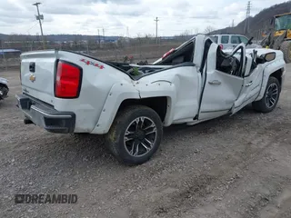 2014 Chevrolet Silverado 1500 LTZ with VIN 1GCVKSEC1EZ209992, listed as a IAAI auction lot 41848951 with 174,111 mi miles and . Bid and sale history available at DreamBid. Image 4.