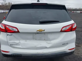 2020 Chevrolet Equinox LT with VIN 2GNAXUEV5L6220104, listed as a IAAI auction lot 42016377 with 66,700 mi miles and . Bid and sale history available at DreamBid. Image 6.