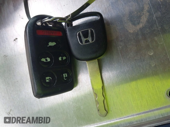 2010 Honda Odyssey EX-L z VIN 5FNRL3H78AB030254, wystawiony jako IAAI lot #42742510 z przebiegiem 277 913 mil mil oraz . Historia ofert i sprzedaży dostępna na DreamBid. Obrazek 11.