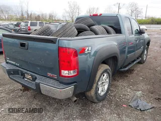 2009 GMC Sierra 1500 SLE with VIN 1GTEK29009Z214672, listed as a IAAI auction lot 41941003 with 165,546 mi miles. Bid and sale history available at carsss.com. Image 4.
