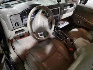 2010 Jeep Commander Sport with VIN 1J4RG4GT7AC113206, listed as a Copart auction lot 56103825 with 174,306 mi miles and Salvage title. Bid and sale history available at DreamBid. Image 8.