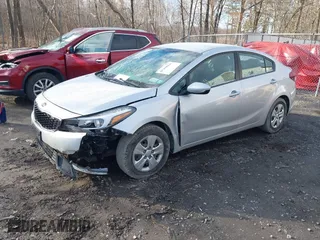 2018 Kia Forte LX with VIN 3KPFK4A74JE167784, listed as a IAAI auction lot 41969966 with 76,521 mi miles. Bid and sale history available at carsss.com. Image 2.