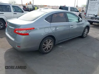 2014 Nissan Sentra SR z VIN 3N1AB7AP1EY322830, wystawiony jako IAAI lot #41981525 z przebiegiem 129 498 mil mil oraz . Historia ofert i sprzedaży dostępna na DreamBid. Obrazek 4.