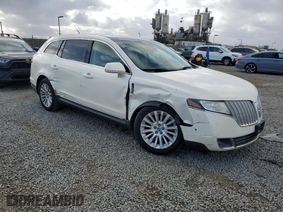 2012 Lincoln MKT EcoBoost with VIN 2LMHJ5AT9CBL52373, listed as a Copart auction lot 51474715 with 98,905 mi miles and Salvage Title. Bid and sale history available at DreamBid. Image 4.