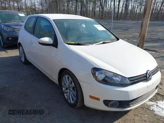 2012 Volkswagen Golf TDI w/Sunroof & Nav with VIN WVWBM7AJ5CW148224, listed as a IAAI auction lot 41426896 with 128,593 mi miles and . Bid and sale history available at DreamBid. Image 1.