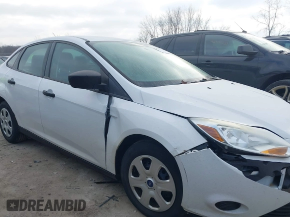 2013 Ford Focus S with VIN 1FADP3E20DL332636, listed as a IAAI auction lot 40917274 with 112,956 mi miles. Bid and sale history available at carsss.com. Image 13.