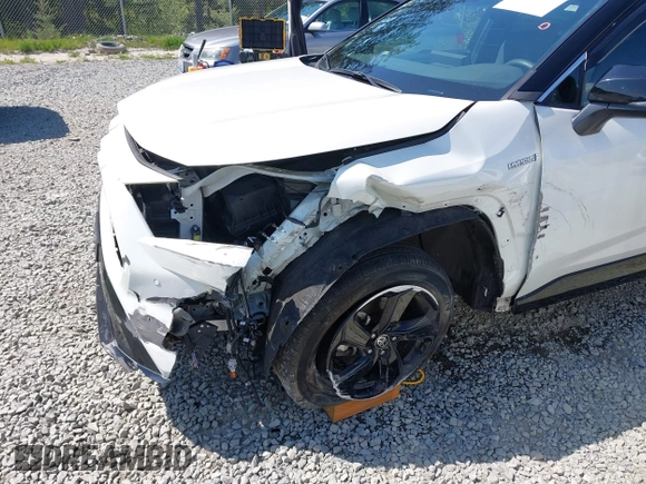 2021 Toyota RAV4 Hybrid XSE with VIN 4T3E6RFV9MU040817, listed as a IAAI auction lot 42182773 with 39,438 mi miles and . Bid and sale history available at DreamBid. Image 6.