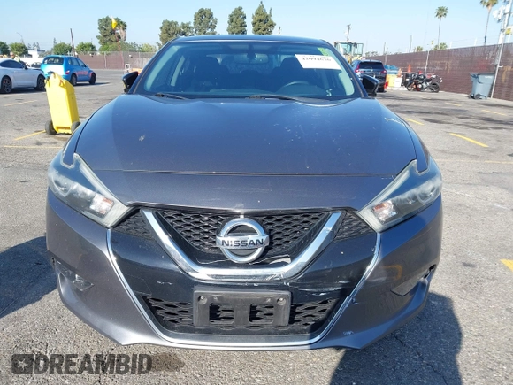 2018 Nissan Maxima SL with VIN 1N4AA6AP1JC400557, listed as a IAAI auction lot 42094626 with 96,764 mi miles and . Bid and sale history available at DreamBid. Image 12.