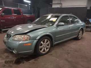 2002 Nissan Maxima GLE z VIN JN1DA31A12T308581, wystawiony jako IAAI lot #41742949 z przebiegiem 116 892 mil mil oraz . Historia ofert i sprzedaży dostępna na DreamBid. Obrazek 2.
